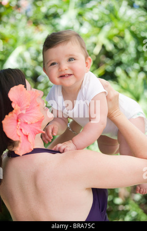 Mom and happy baby outside Stock Photo