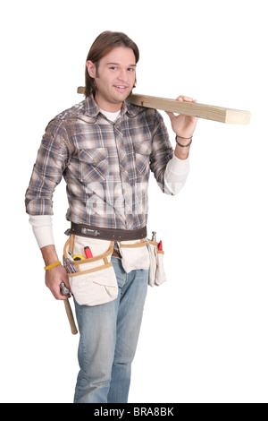 one twenties young man working construction labor with tools over white Stock Photo