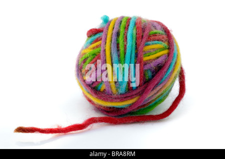 Multi colour ball of wool on white background Stock Photo