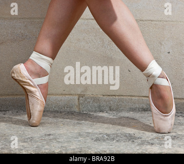 Ballerina feet standing en pointe, London, England, UK Stock Photo