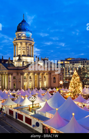 Traditional Christmas Market at Gendarmenmarkt, illuminated at dusk, Berlin, Germany, Europe Stock Photo