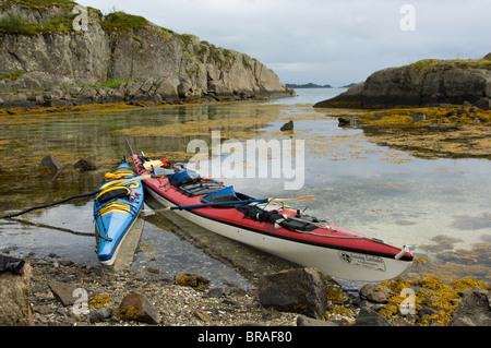 Europe, Norway, Lofoten. Sea kayaks in the intertidal zone. Stock Photo