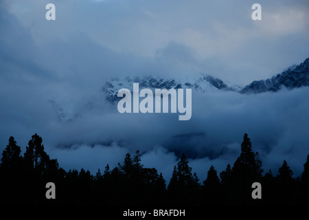 Clouds Around Mountaintops, New Zealand Stock Photo