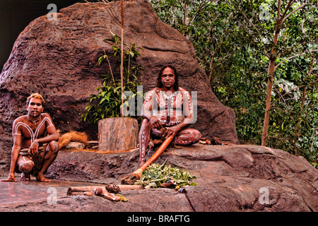 Body Painted Tjappukai Aboriginal natives with Didgeeridoo in Cairns Australia Queensland  Stock Photo