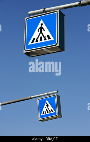 German pedestrian crossing signs against blue sky Stock Photo - Alamy