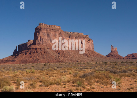 A massive butte adjacent to Monument Valley Navajo Tribal Park, Arizona, United States of America, North America Stock Photo