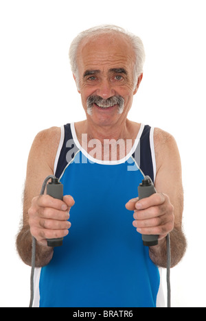 Senior Citizen holding a skipping rope working out Stock Photo