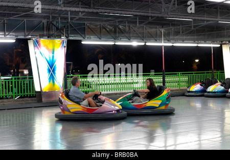 Father and Daughter in Dodgem Cars Nettuno Park Funfair catania  Sicily Italy Stock Photo