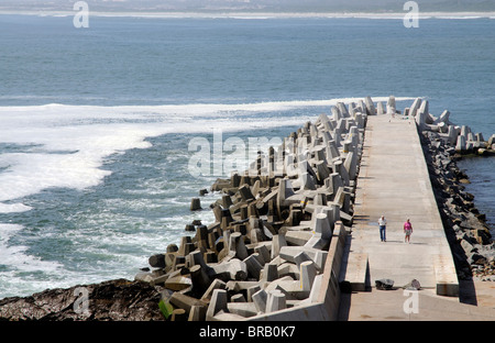 Dolosse protect the harbour wall at Yzerfontein a popular seaside resort on the west coast of South Africa Stock Photo
