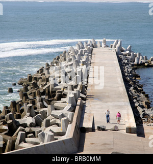 Dolosse protect the harbour wall at Yzerfontein a popular seaside resort on the west coast of South Africa Stock Photo