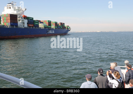 A container ship laden with goods from Hong Kong entering New York harbor. Stock Photo