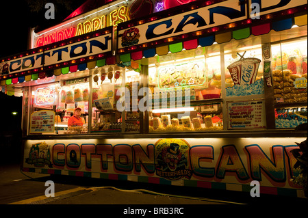 A WOMAN WORKING THE COTTON CANDY STAND AT THE MINNESOTA STATE FAIR Stock Photo