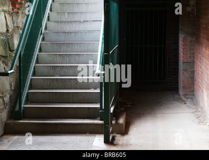 Downtown labeled staircase leading to the lower level of the pottery barn  in the flatiron district, Manhattan, NYC, USA Stock Photo - Alamy