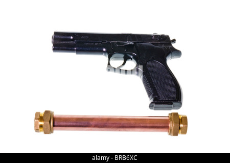 Pipebomb and handgun Stock Photo