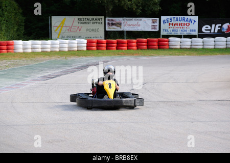 Woman driving in a go-kart Stock Photo