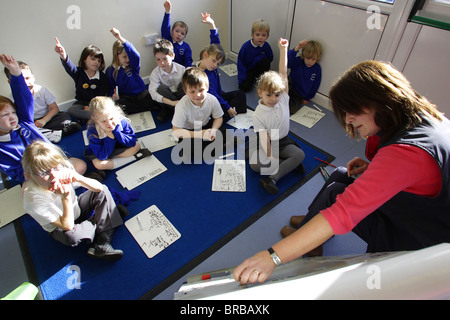 Phonics reading classes at a primary school in Devon, UK. Stock Photo