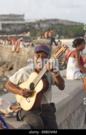 Guitar player on the Malecon in Havana, Cuba, West Indies, Central America Stock Photo