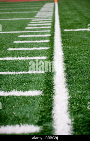 American football field markings on sideline of astro-turf field Stock Photo