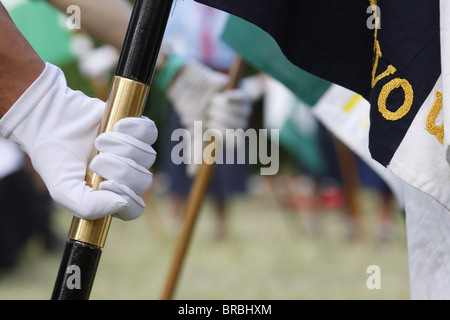 Scouts' gloves on flag masts, Villepreux, Yvelines, France Stock Photo