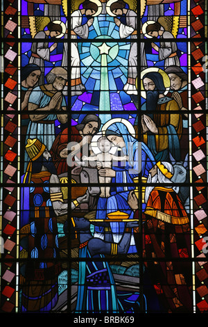 Stained glass of Nativity in Notre Dame du Rosaire Catholic church, Saint-Ouen, Seine-Saint-Denis, France Stock Photo