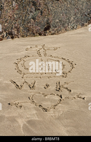 W and K, Prince William and Kate Middleton. Wills and Kate. A Royal romance. Love letters in the sand. Prince of Wales Stock Photo