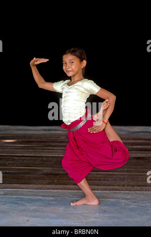 Girls performing the Apsara dance in a dance school, Phnom Penh, Cambodia Stock Photo