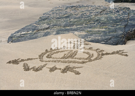 W and K, Prince William and Kate Middleton. Wills and Kate. A Royal romance. Love letters in the sand. Prince of Wales Stock Photo