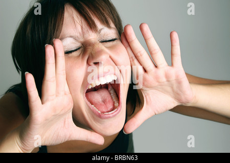 A screaming woman Stock Photo