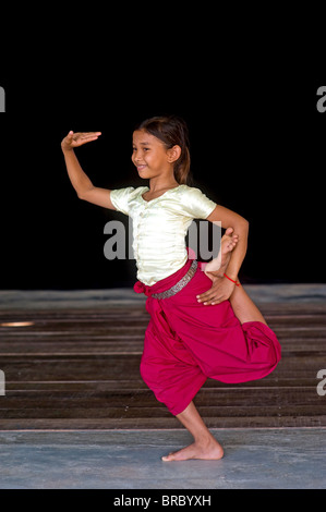 Girls performing the Apsara dance in a dance school, Phnom Penh, Cambodia Stock Photo