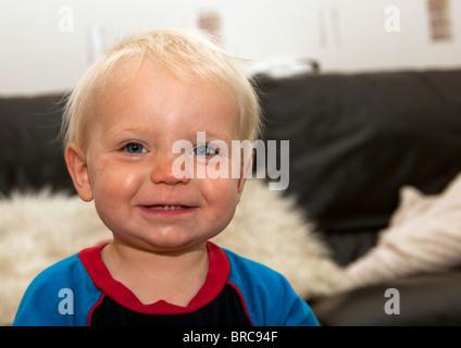 Toddler grinning for camera