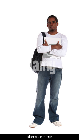 An attractive young student standing in front of a plain white background. Stock Photo