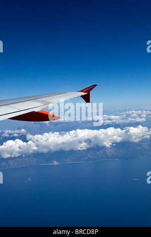 Wing of EasyJet aircarft during flight Stock Photo