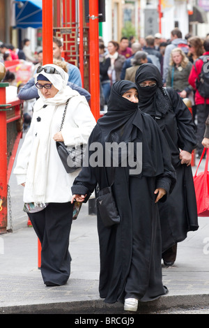 muslim women shopping Stock Photo