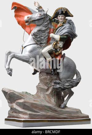 Emperor Napoleon I (1769 - 1821) - a coloured porcelain figure., With bicorne and coat on a rearing white horse, his right hand pointing ahead. Inspired by J.L. David's painting 'Napoleon Crossing the Alps at the Saint-Bernard Pass'. Colour-glazed porcelain, the base with the maker's mark Sitzendorf A. Voigt AG / VEB Sitzendorfer Porcelain Manufactory, made after 1954. Firing flaw in the base. Height 41 cm. people, 1950s, 20th century, France, Imperial, French Empire, object, objects, stills, clipping, cut out, cut-out, cut-outs, man, men, male, Stock Photo