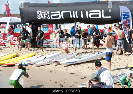start of a stand up paddleboard race, Windfest 2010, at Sandbanks beach in Poole Stock Photo