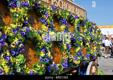 A Hacker-Pschorr horse drawn carriage loaded with beer barrels at the 2010 Munich Oktoberfest. Stock Photo