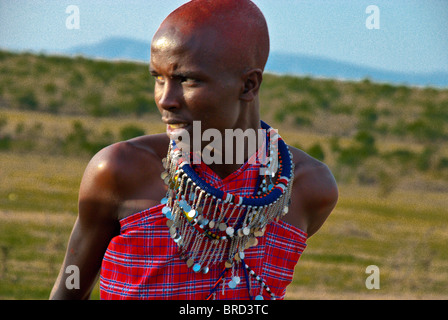 Masai woman wearing traditional dress, Masai Mara, Kenya, Africa Stock Photo