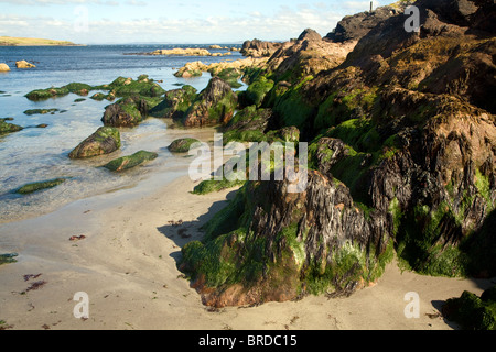 Rocks and sandy beach, Melby, near Sandness, Mainland, Shetland Islands, Scotland Stock Photo