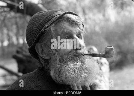 Old man called Joe Morris smoking pipe at Linley Brook near Broseley Shropshire 1973 Stock Photo