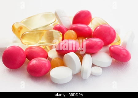 Close-up of an assortment of generic pills on a white background Stock Photo