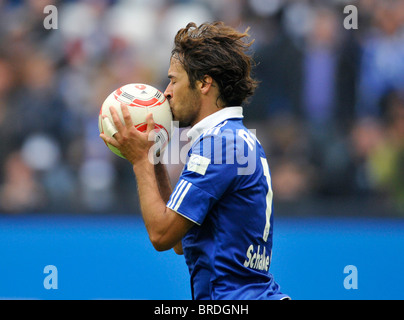 RAUL kisses the ball after scoring his first goal in the german Bundesliga during the match Schalke vs Moenchengladbach Stock Photo