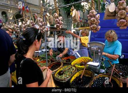 French people, olive vendor, selling olives, black olives, green olives, Wednesday Market, city, Saint-Remy-de-Provence, Provence, France, Europe Stock Photo