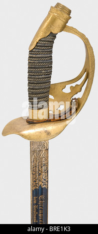 An infantry sword as first prize for outstanding marksmanship 1902, awarded to Lieutenant Thümmel of the Infantry Regiment von Goeben (2nd Rhenish) No. 28 Damascus wedge blade with double fullers on both sides bearing the corresponding gilded dedication or the cipher 'W II' respectively between floral decorations on a blued background (redone). Inscribed 'Eisenhauer' or 'Damaststahl' on each side of the ricasso respectively and 'Weyersberg, Kirschbaum & Cie Solingen' and a proof mark on the back. Gilded (redone) knuckle-bow hilt with laurel leaf decoration. The, Stock Photo