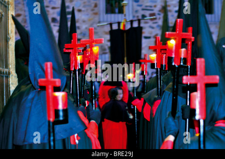 Spain,Extremadura: Nocturnal easter procession in the medieval center of Cáceres Stock Photo