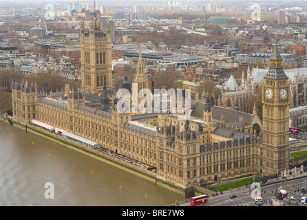 A birds eye view over the Thames of the Palace of Westminster (Houses of Parliament) and Westminster from the London Eye in London, England, UK. Stock Photo