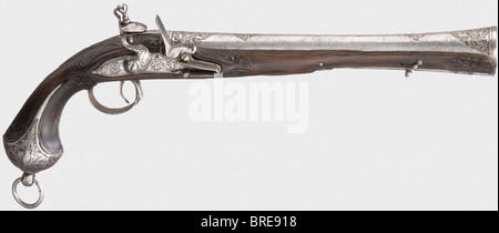 An Ottoman blunderbuss pistol, 18th century Round barrel, widening into a trumpet-shape at the muzzle with remnants of chiselled and gilt ornamental designs on the muzzle and breech. Iron flintlock, cut with intertwined monsters. Carved dark walnut stock with chiselled (somewhat pitted) furniture. Iron pommel ring and short iron ramrod. Length 47 cm. historic, historical, 18th century, Ottoman Empire, handgun, handheld, firearm, fire arm, gun, fire arms, firearms, guns, weapon, arms, weapons, arms, pistols, object, objects, stills, clipping, clippings, cut out,, Stock Photo