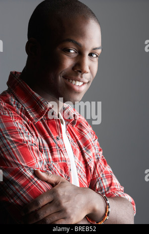 Fashionable Young Man Wearing Casual Clothes In Studio Stock Photo