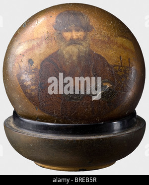 A small lacquered case bearing the portrait of a peasant, Court Purveyor Lukutin, Moscow Black and gold lacquer. Maker's signature, 'Lukutin' under a Russian double eagle inside the lid. Diameter 6 cm. Provenance: Grand Duchess Vera Konstantinovna Romanova (1854 - 1912). historic, historical, people, 19th century, vessel, vessels, object, objects, stills, clipping, clippings, cut out, cut-out, cut-outs, Stock Photo