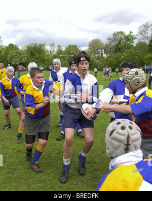 Young rugby union players in inter-club games and receiving structured training. Fitness for all shapes and sizes. In UK. Stock Photo