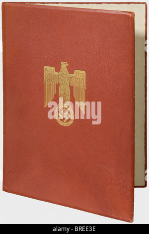 A folder for the appointment document to General Field Marshal, Frieda Thiersch Red-brown leather folder, dimensions 34.5 x 46 cm. On the front side is a national eagle stamped in gold. The interior is dressed out with paper (slightly damp-stained). In the middle of the lower right edge is the gold-stamped maker's mark 'Frieda Thiersch'. The folder for the General Field Marshal document differs in size from those for Generals and for Knight's Cross winners. Slightly dented. historic, historical, 1930s, 20th century, army, armies, armed forces, military, militar, Stock Photo